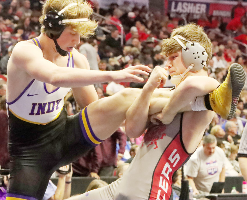 After receiving a first-round bye, senior Seth Madden gets control of Indianola's Dax Clatt and grinds out a 7-4 decision win to start his tournament.
