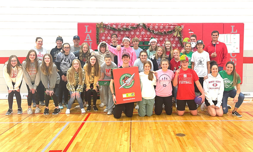 North Scott Fellowship of Christian Athletes and volunteers wrapped and packaged 150 Christmas Child gift boxes for distribution overseas.