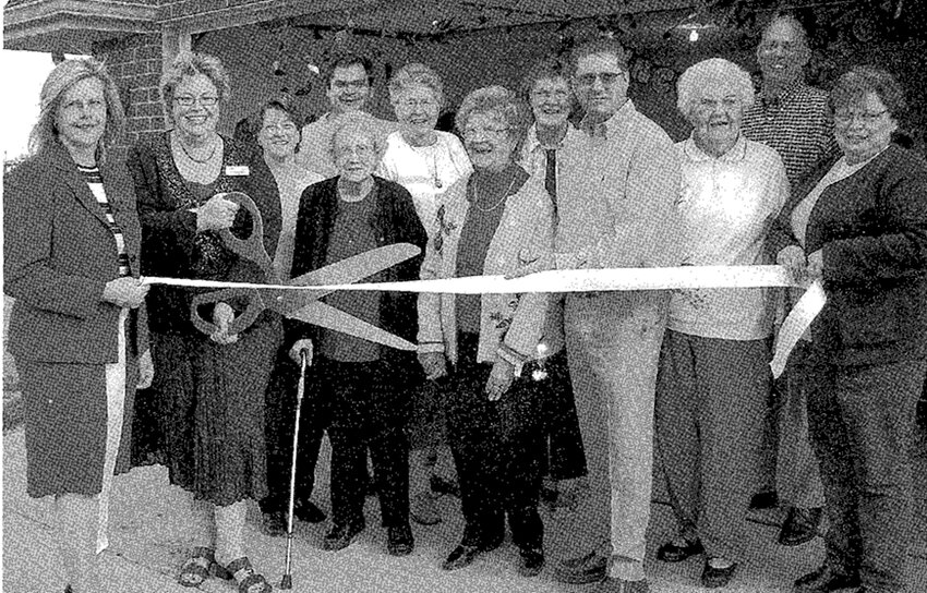 May 14, 2008: Grand Haven Retirement Community held a ribbon cutting to mark the opening of a set of new townhomes. Participants included Lynette Olson, Joni Fahrenkrog, Carolyn Scheibe, Dan Collins, Dorothy Clapp, Betty Spies, Helen Keppy, Lois Kluever, Joe Callahan, Dorothy Mohr, Frank Wood and Sue Anderson.