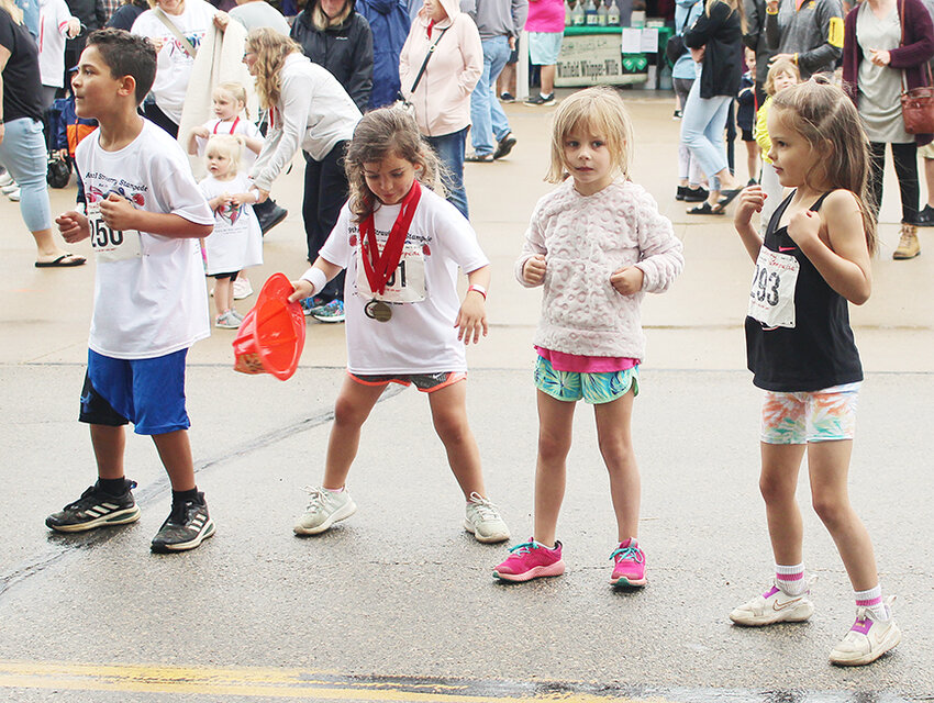 A dance party broke out just before the parade, with the Chicken Dance, Hokey Pokey and YMCA.