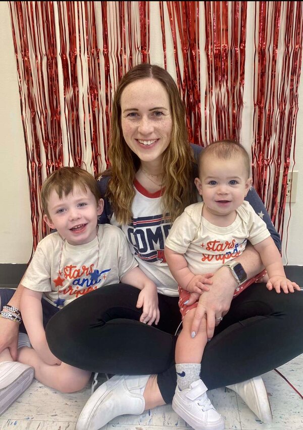 Maddie Villhauer pictured with her son's Harrison and Declan, is the new director at the West Liberty Child Care Center.