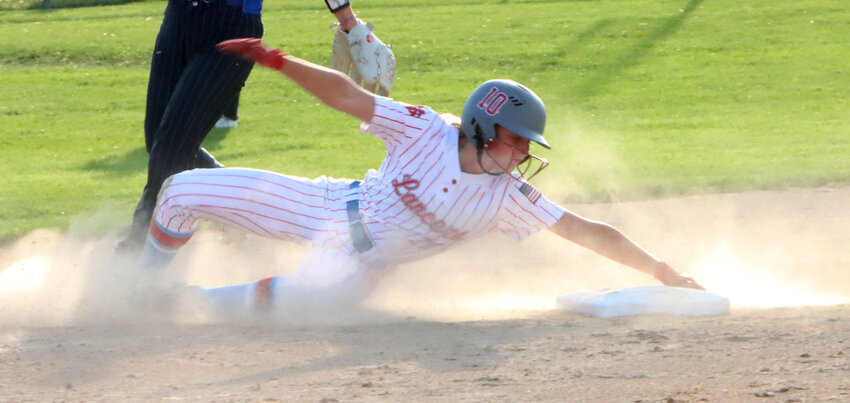 Lancer senior Natalie Naber nearly flies over the second base bag but holds on for the steal.