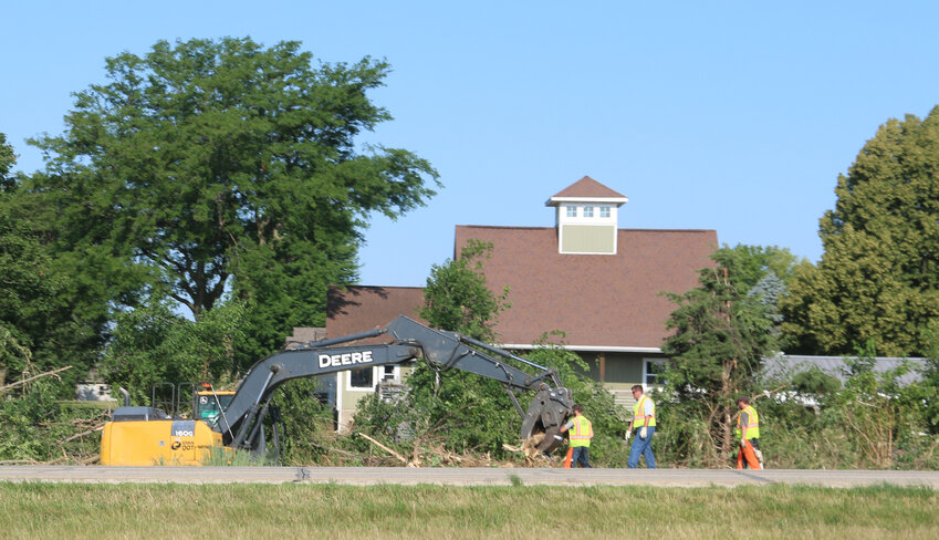 Iowa DOT crews remove dead ash trees July 7,  on U.S. 61 next to Rustic Ridge golf course, Eldridge