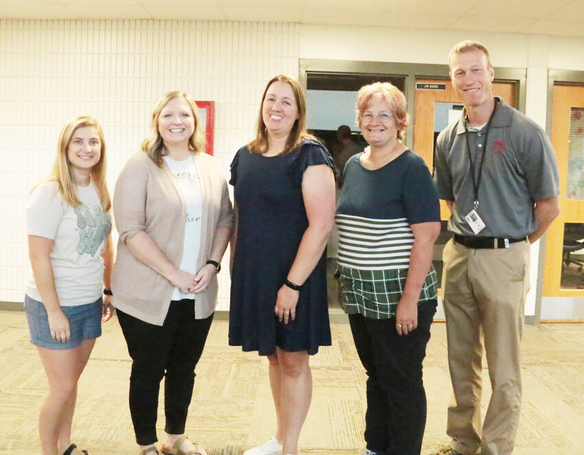 Armstrong elementary principal Tim Green, right, poses with new staff, from left, Nicole Pessmann, Jennifer Hermanson preK-5; Stefanie Chase, third grade; and Dawn Rhodes, reading interventionist.
