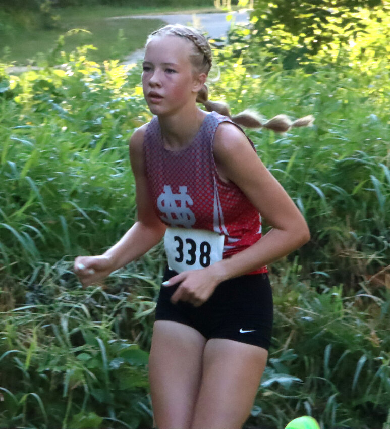 Sophi Schneckloth got her high school career off to a great start with a second-place team finish.