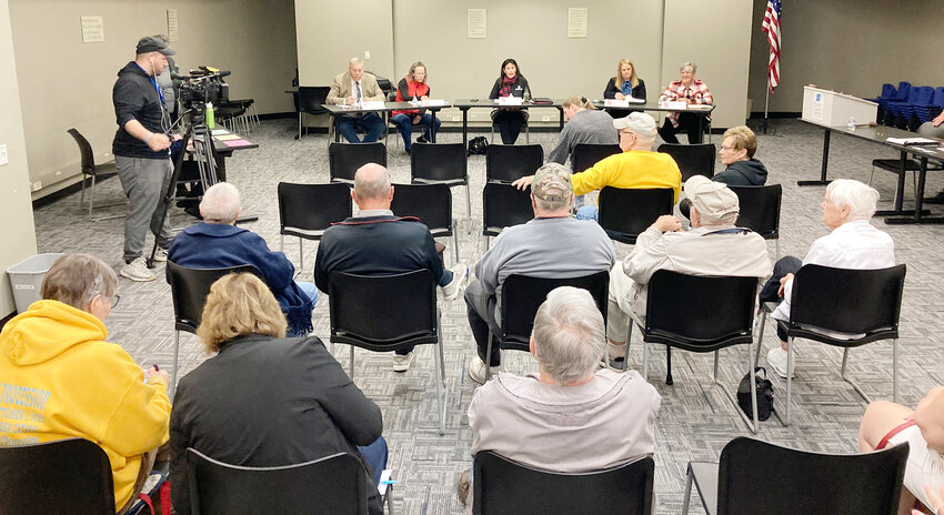 About 20 attended Saturday morning's hour long school board candidate forum at the Scott County Library in Eldridge.