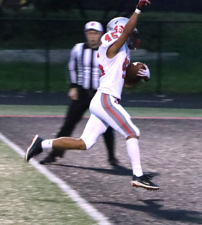 Thanks to Nolan Engelbrecht's puch-out, Lancer senior Colton Voss was able to scoop and score to give North Scott a three touchdown lead three minutes into the game.
