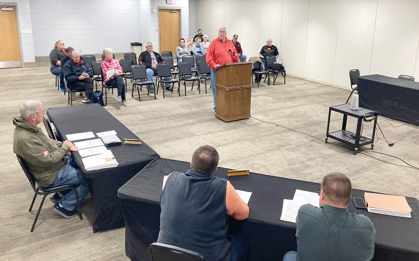 Jack Darland speaks to Eldridge council members Monday, Oct. 16 at the Eldridge community center. The council arranged the center with a podium, camera and microphone for those addressing the council.