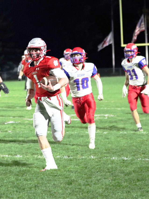 Senior quarterback Kyler Gerardy leaves multiple Vikings defenders in his wake on the first of his two long touchdown runs.