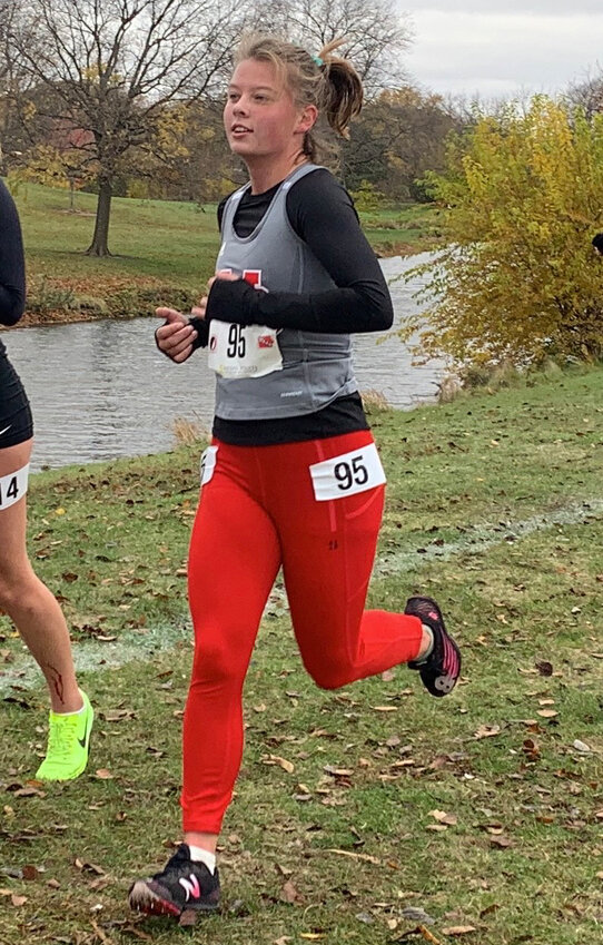 Peyton Madison runs at the 2023 state cross-country race.