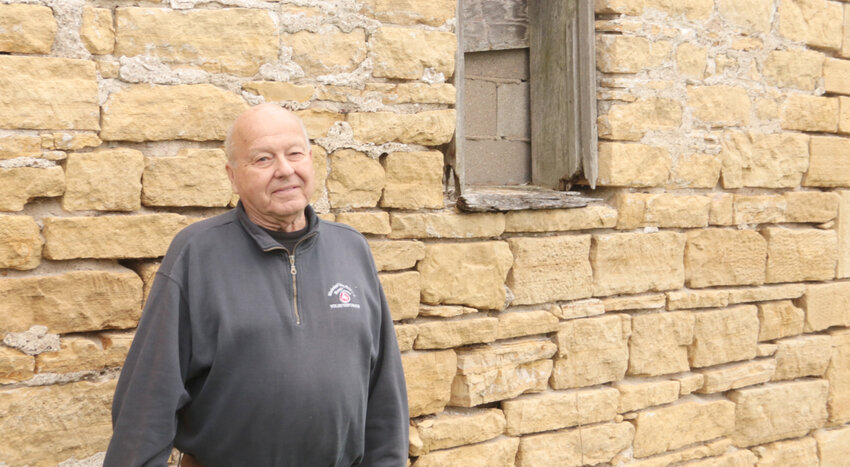 Bob Moellenbeck recalls raising hogs on the first floor of this barn, which held horses, grain and tools up top. &quot;Not one original building is left. Just this barn foundation.
