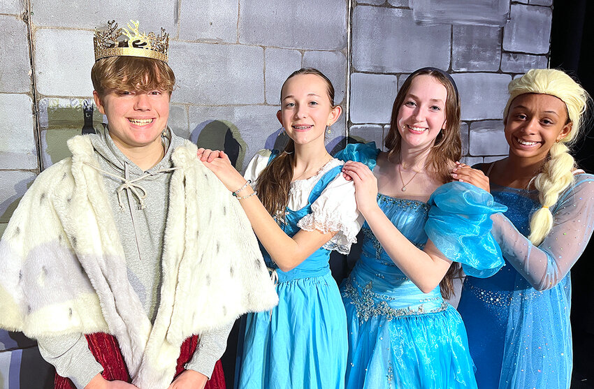 King Briggs Oien and his three daughters, from left, Lydia Shuger as Belle, Lilly Shugeer as Cinderella and Cece Robinson as Ellie or Elsa, are among the main actors in &ldquo;Game of Tiaras,&rdquo; a comedy set for the Wilton High School Auditorium stage on Thursday and Friday, Nov. 16-17.
