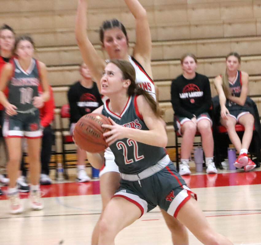 In her first high school basketball game since February 16, 2022, senior Mercie Hansel led the Lancers past the Falcons with a game-high 19 points.