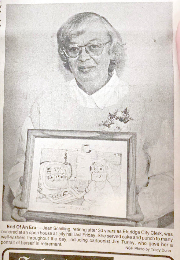 Jean Schilling retired in December 1998 after 30 years as Eldridge city clerk. NSP cartoonist Jim Turley presented her with a portrait.