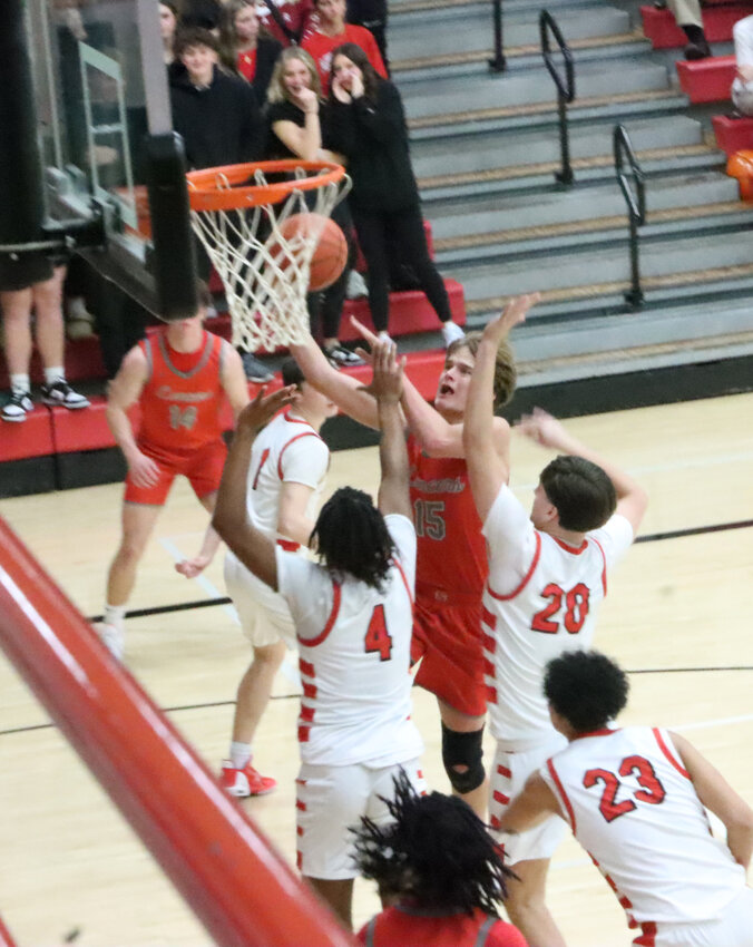 While he did most of his work from the outside, Lancer senior Brennan Reid converted a big and-one in the third quarter to put the Lancers up double-digits