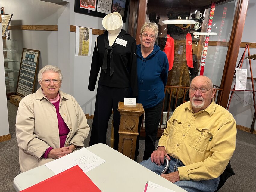 Members of the Tri-County Heritage &amp; Genealogy Museum board show some of the new items they attracted last year including a WWII Sailor uniform and a newel post taken from the former Durant High School. From left are board members Erna Cielecki, Mary Erickson and Dale Thede. Other board members include Annette Richardson, Brad Mumm and Dawn Smith.