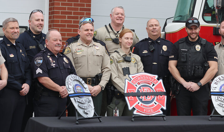 Scott County first responders gathered Feb. 21 to send these badges off to Burnsville, Minn.
