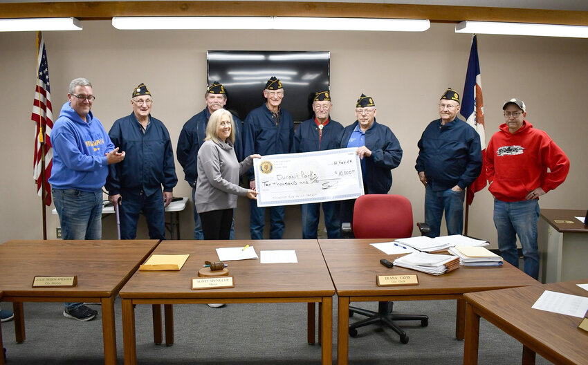 The presentation of the giant check for $10,000 from the Durant American Legion Post 430 on Feb. 12 for playground equipment in Feldhaun Park included city council member Kevin Mundt, Legion members Dick Frick and Roger Howe, council member Conni Daufeldt, Legion members Merlyn Frick, Ray Arp, Post Commander Len Rochholz and Keith Ornsby as well as park board member Marcus Ostofi.