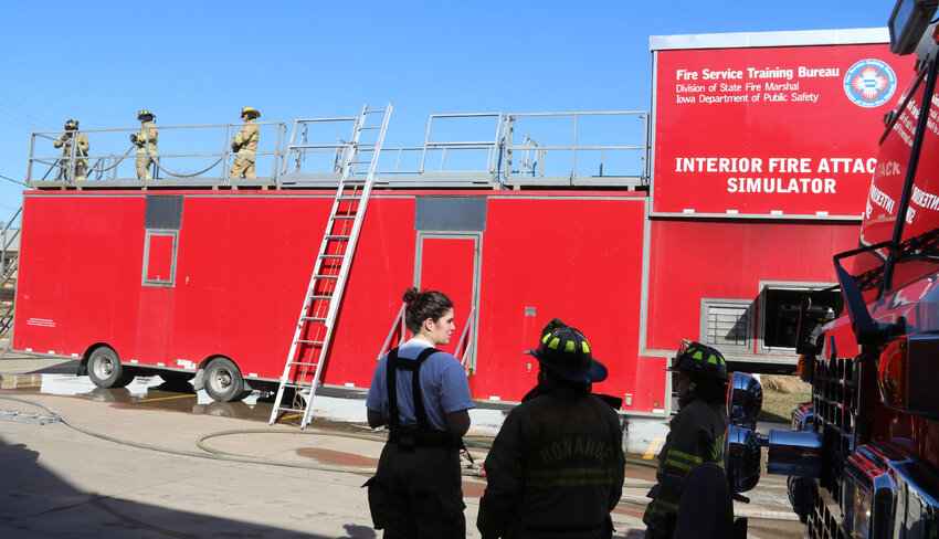 The Iowa Fire Service Training Bureau's interior fire attack simulator offers volunteers training with propane-fueled fires controlled by an instructor.