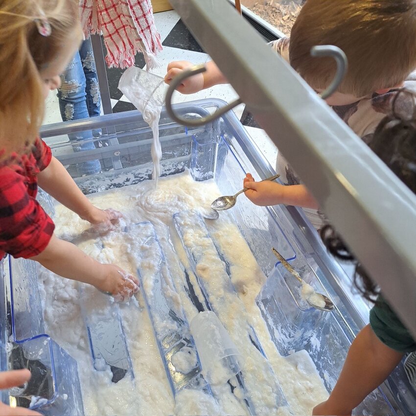 Having fun with clean mud, kiddos used a mixture of ivory soap, ripped up toilet paper and water at the Wilton Public Library