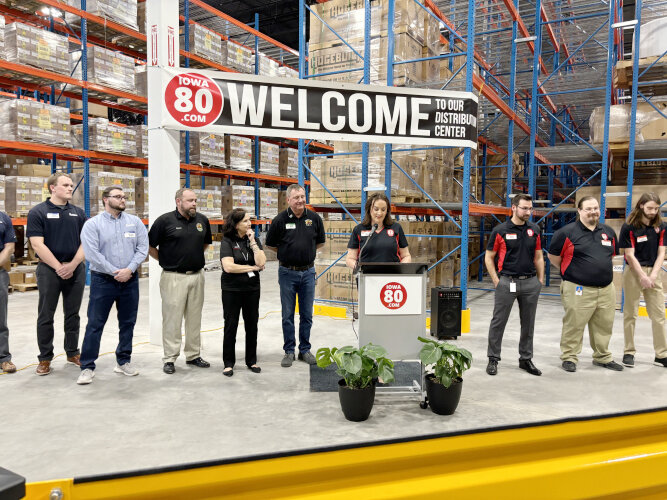Iowa 80 staff celebrate the opening of a 133,000 square foot warehouse.