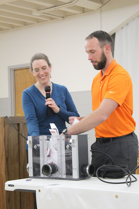Conservation Manager for the Heartland Co-Op Ruth McCabe and Conservation&nbsp;agronomist with Heartland Co-Op Emery Davis presented during the Lower Cedar Watershed Winter Banquet.   Photo by Jacob Lane