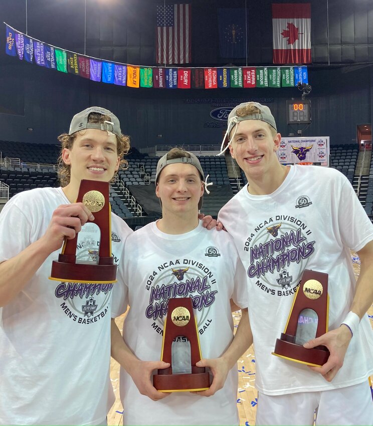 Dylan Peeters (right) poses with teammates and roommates Elijah Hazekamp (left) and Sam Nissen (middle).