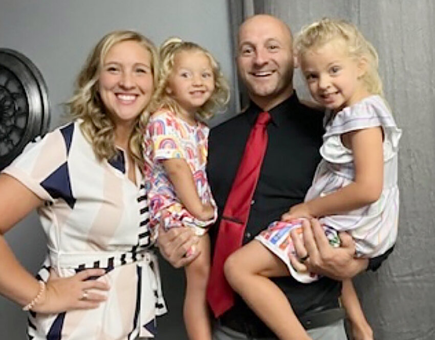 New high school principal Andrew Lehn with his wife Suzanne, and daughters Brielle and Violet.