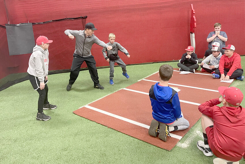 North Scott Little Leaguers watch umpire training in preparation for this year&rsquo;s season.