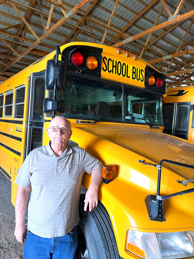 Standing next to a school bus, Charlie Paustian says he&rsquo;ll miss transporting kids, but after 19 years of service, Charlie is leaving the Durant-Wilton team of bus drivers