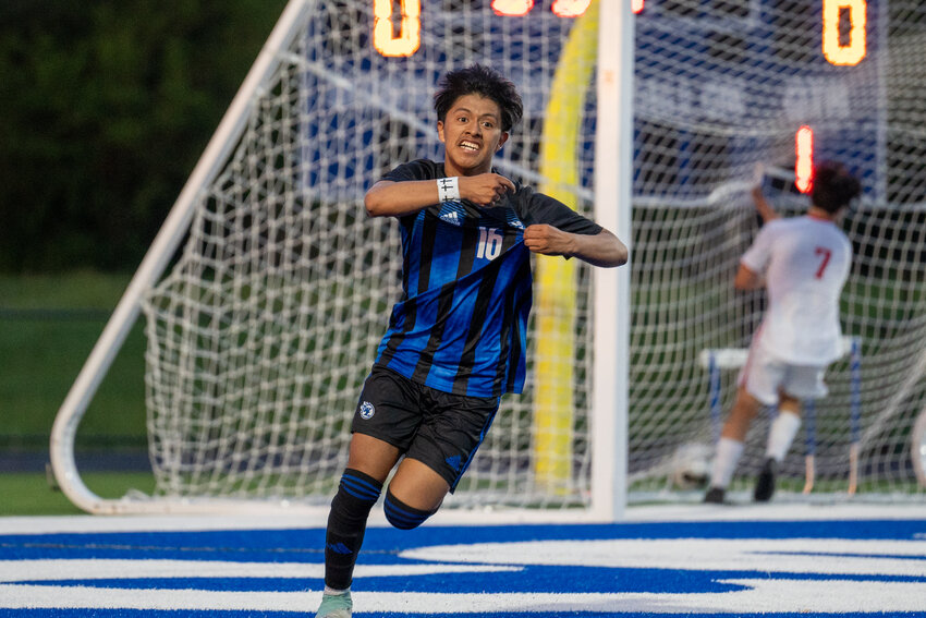 Comet senior Pascual Pedro celebrates his goal during last Friday's match against West Branch