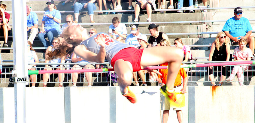 Senior Sydney Skarich battles the bar and the sun during the high jump Thursday afternoon.