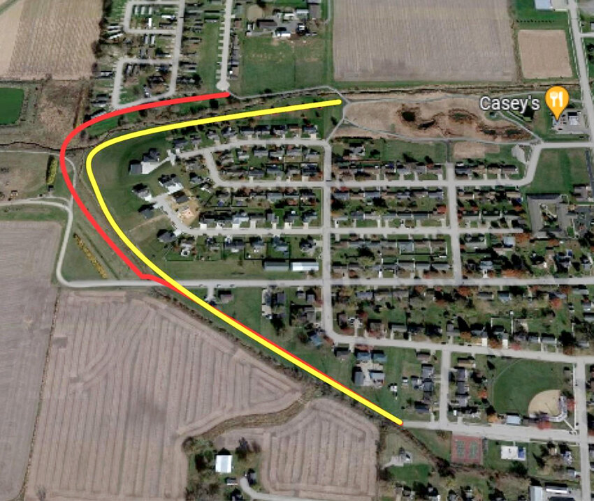 The yellow line marks the trail as planned along an existing easement in the Westbrook addition. The red line shows an alternate path over land the city would need to purchase.