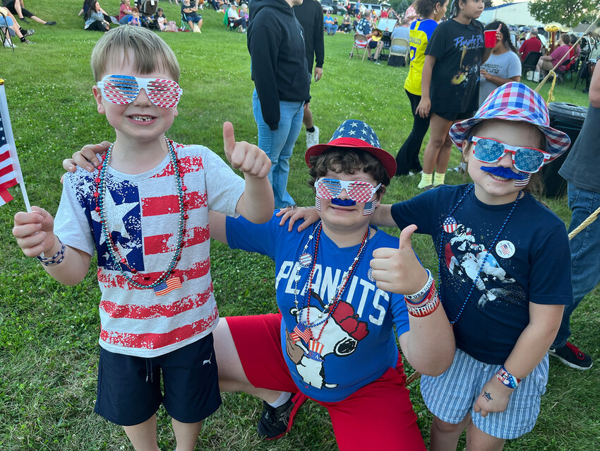 Outfitted in Independence Day gear were Calvin Bezdek and his sister, Hannah of Wilton as well as their cousin, Graham Kerschenske of Iowa City.
