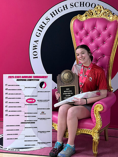 North Scott junior Lindy Dhuse sits on her throne as the new queen of Class 2A.