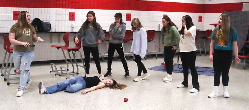 Scarlett (Ally Sosnowski) leads the investigation into Snow White's (Elsie Jacobs) attack. Her fellow woodland dwellers include Clumsy (Liza Clark), Plucky (Michael Hames), Daring (Reilly Nienhaus); Twinkle Toes (Rylie O'Flahrity), Spindiana Jones (Sophia Neves-Schmitt) and Grimmly (Sayla Looney).