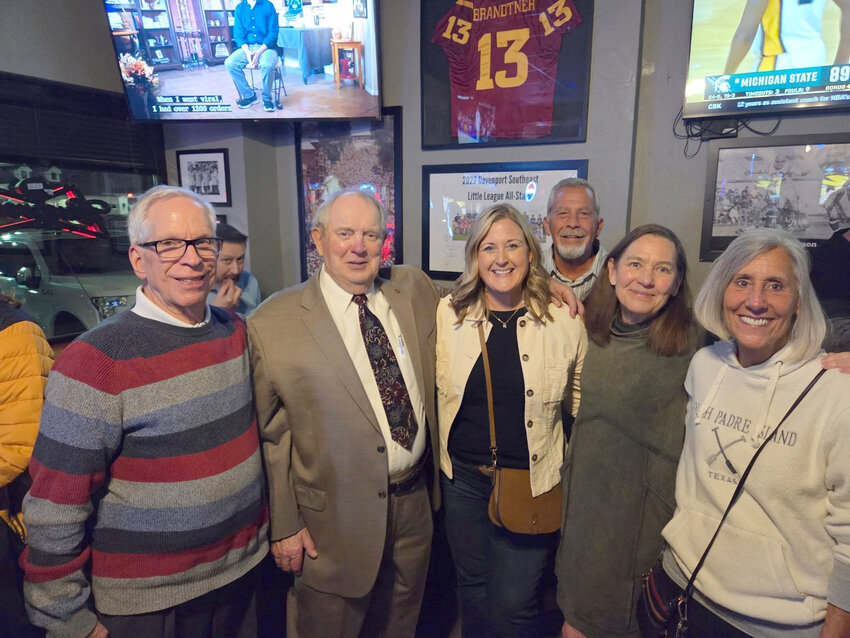 National GOP committeeman Steve Scheffler, left,  joins Chuck Brockmann, center,  at his victory party Thursday.