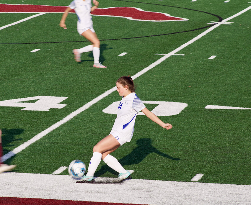 Sophomore Sully Hall dribbles the ball upfield against Mount Vernon.