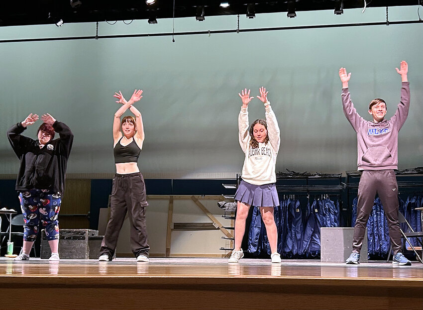 From left, students Tatum Hale, Alyssa Stagg, Bella Lugo, Westley Heath practice their choreography for their &ldquo;You Can&rsquo;t Stop the Beat&rdquo; performance.