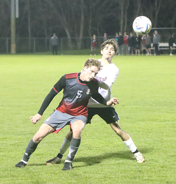 Lancer senior Adam Schneckloth gets his head in the game.