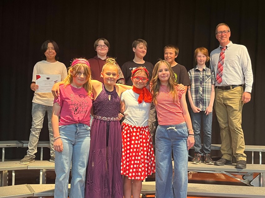 Meet the Bennett Elementary School sixth grade graduating class, which will move onto Durant or Tipton Junior High Schools next year. From left, in front, are Izzy Eicher, Emerson Rasdon, Elena Allison and Emma Gingerich. In the back, with principal Jeremiah Costello on the right, are Manny Turner, John McConnell, Drayven Richard, Dayton Port and Aiden Smith.
