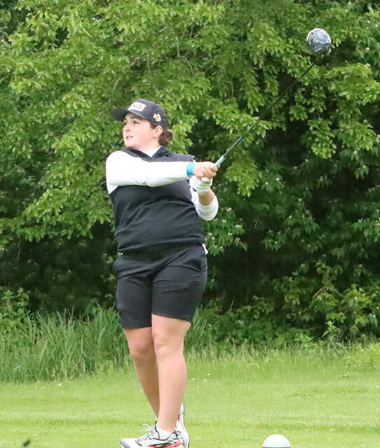 Lancer junior Addison Eckhardt attacked Glynns Creek Golf Course on Wednesday in cold and wet conditions.