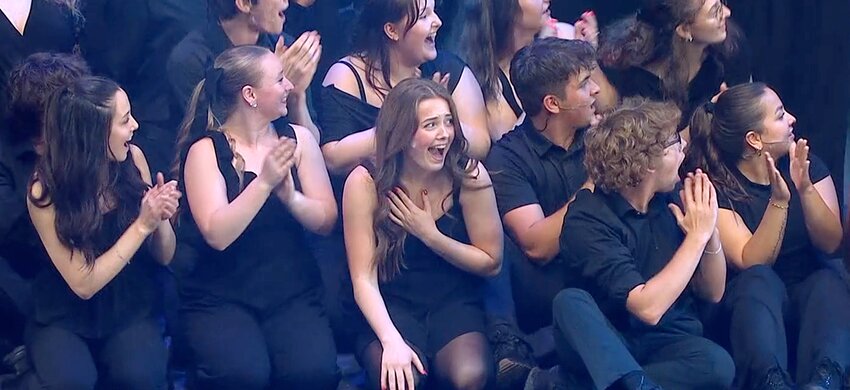Natalie Sierk reacts as she learns she's the winner of the Triple Threat Award at the Iowa High School Musical Theatre Awards.
