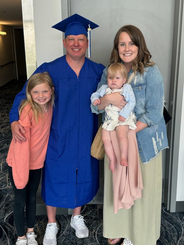 Nick Heath and his family take a celebratory post-graduation photo.