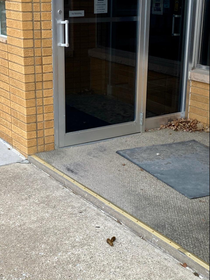 The photo above was taken in front of the Advocate News office door Dec. 18, where dog excrement can be seen on the downtown Cedar Street sidewalk.