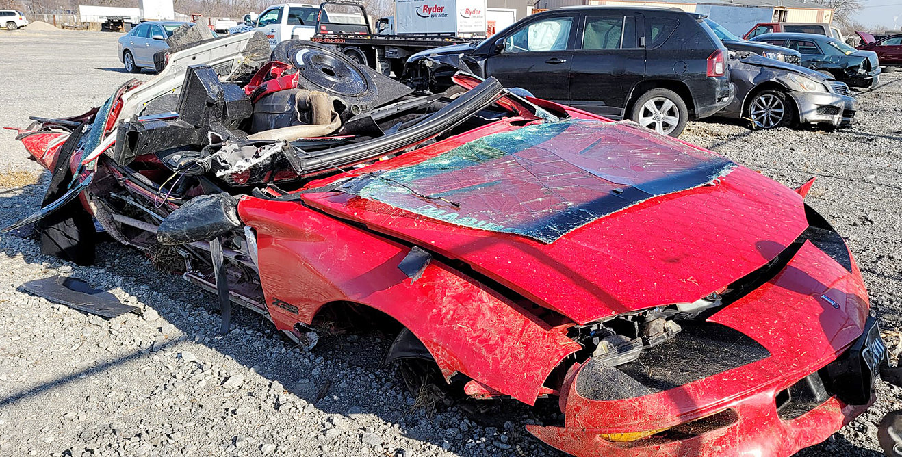 Pictured is what's left of Daryn Clark's Chevy Camaro the day after he was involved in a single-car accident on Moscow Road Dec. 19. Daryn, the son of Wilton Police Chief Dave Clark, remains at the University of Iowa Hospitals & Clinics.