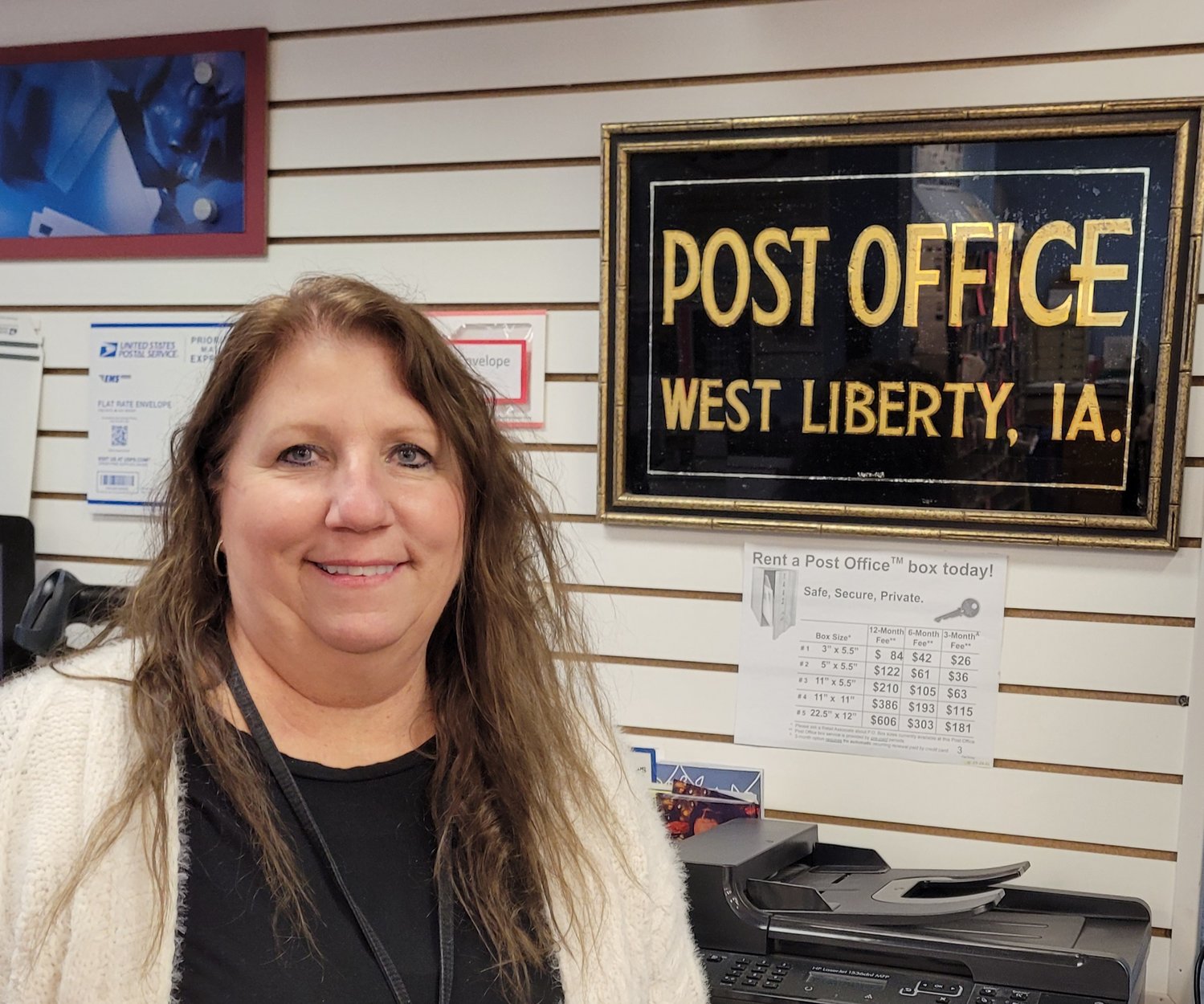 Xann Rodgers-Mather, the postmaster in West Liberty, was honored with a national award.