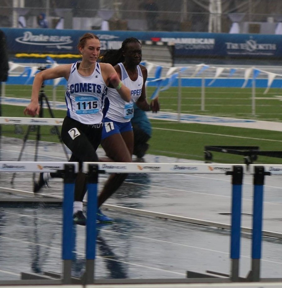 Macy Daufeldt competes in the 100 meter hurdles at Drake.