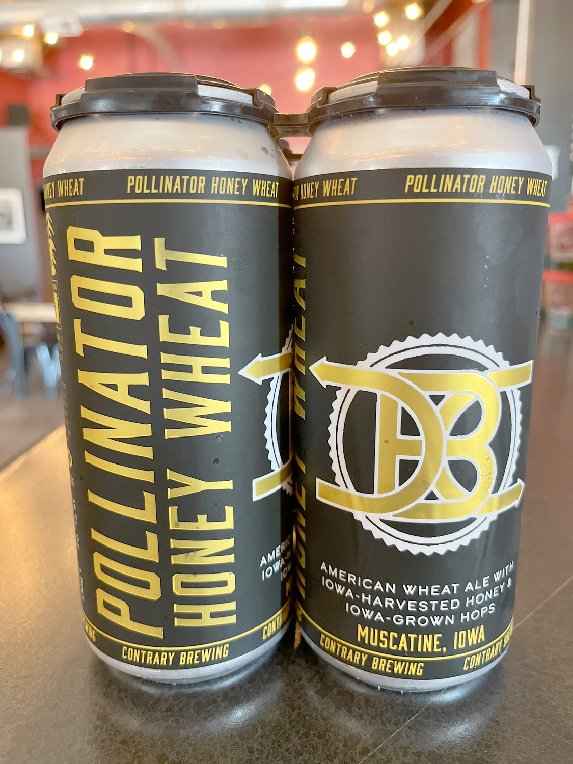 The Pollinator, a honey wheat beer sweetened with Rob Jipp’s honey.  Contrary Brewing Is a small, locally owned business, located in downtown Muscatine. It is owned by Robin and Mark Mitchell.