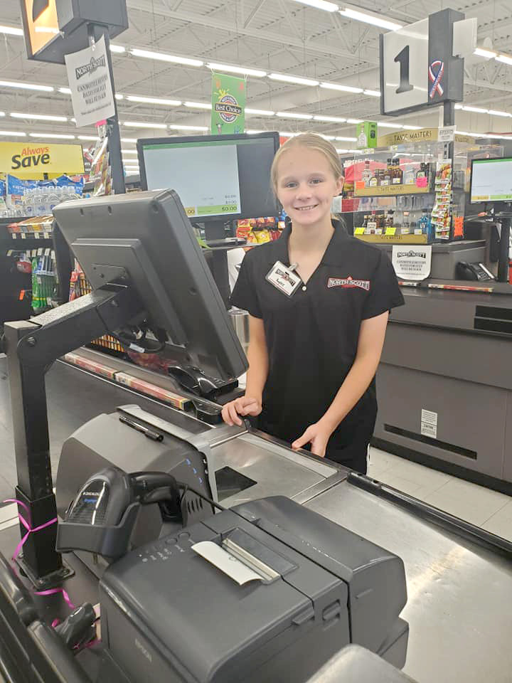 Kaylee Chase enjoyed her cashier experience at North Scott Foods.